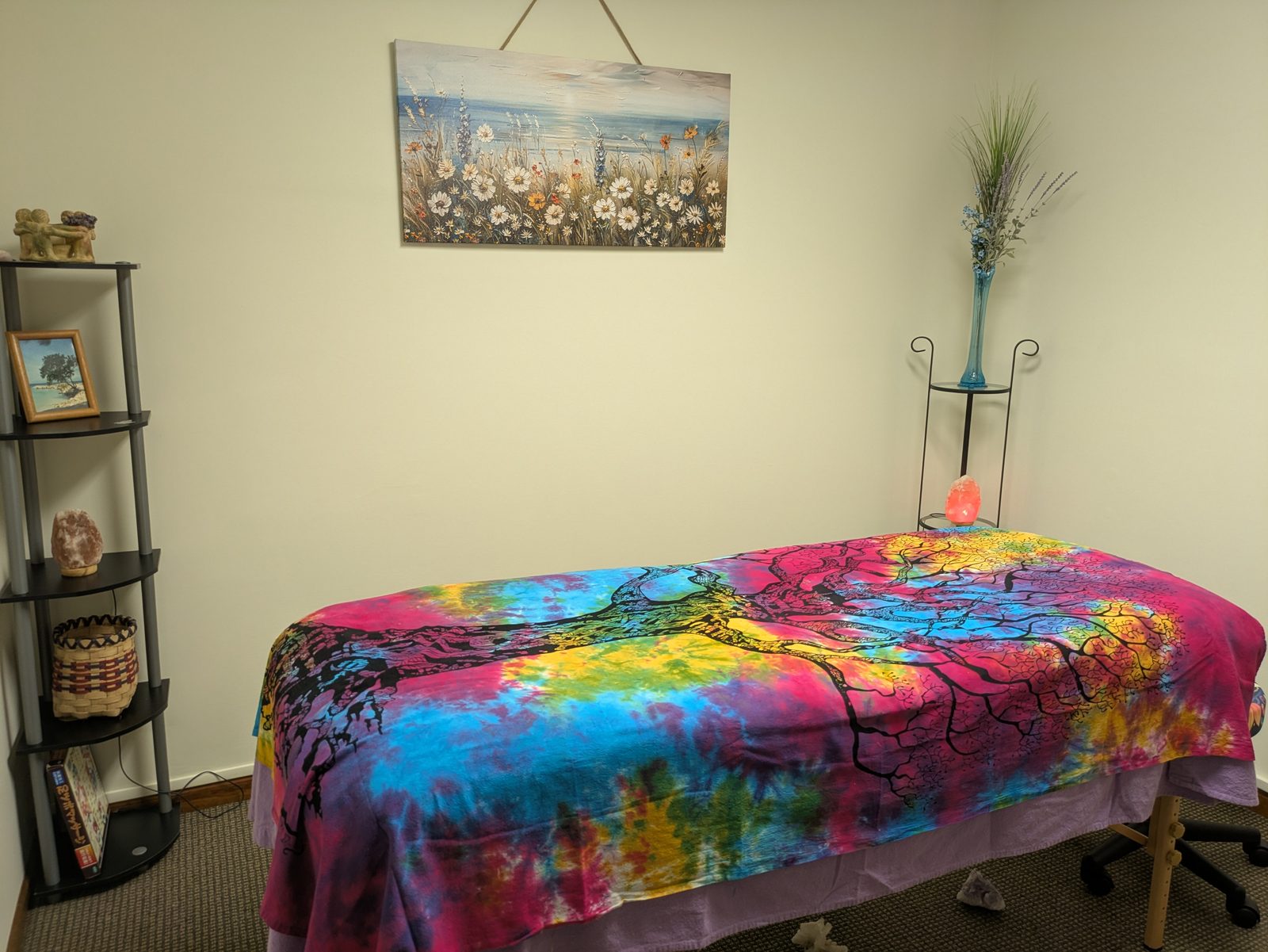 Karen's Healing Touch treatment room — table, salt lamp, and crystals